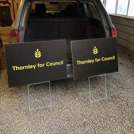 Branded political signs with logo